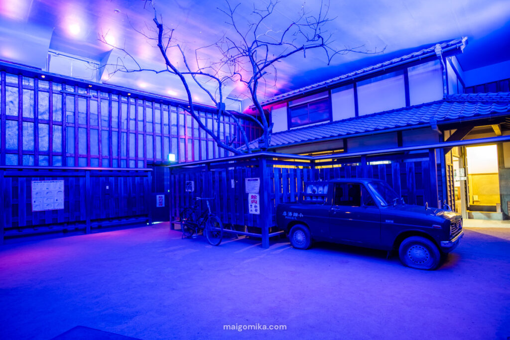 inside the Showa no Machi museum with an immersive light room and traditional Japanese house