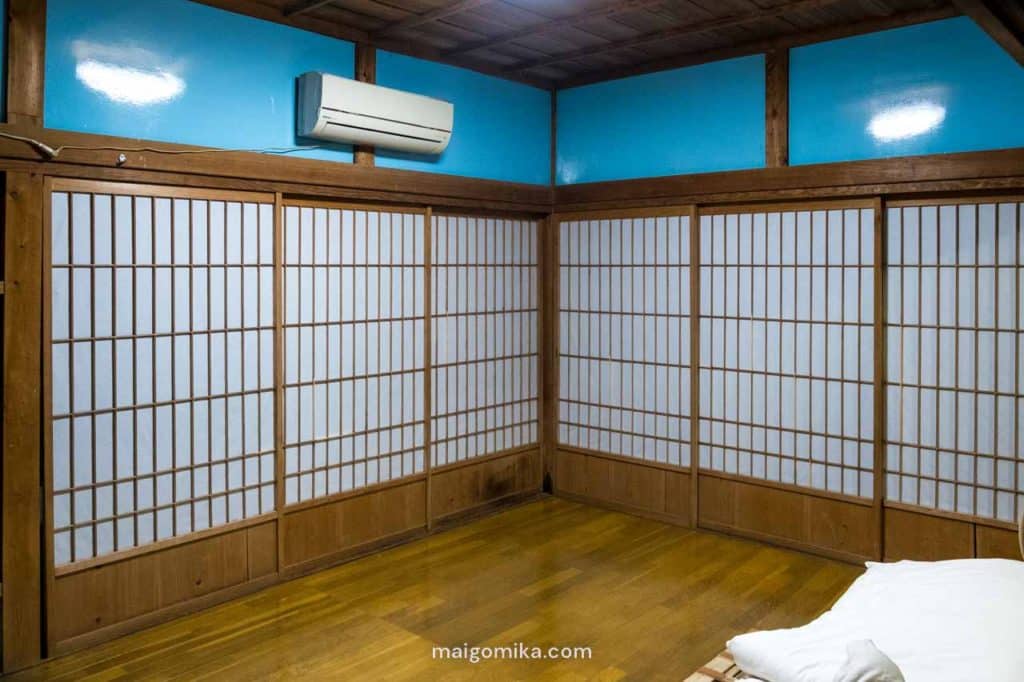 japanese screen doors with blue walls after Japanese House Renovation