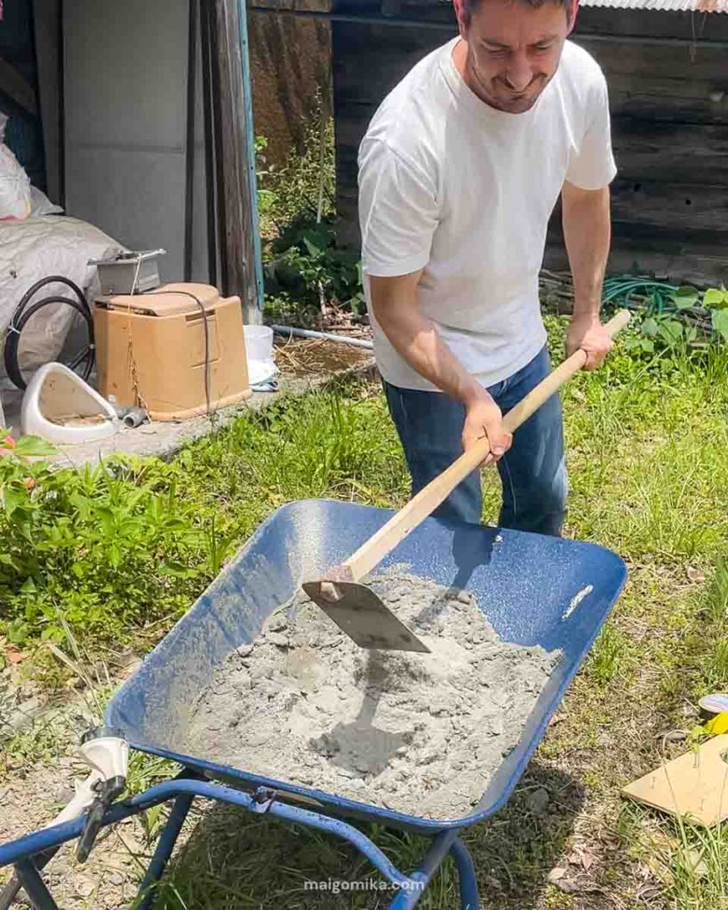 man mixing cement