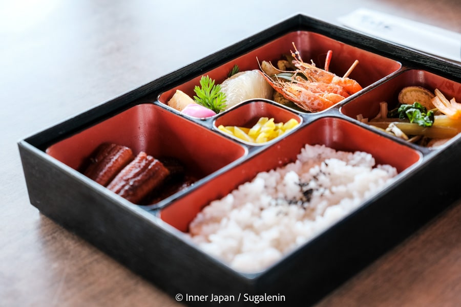 traditional Japanese bento box on the yakatabune sightseeing boat on the Shimanto River in Kochi prefecture