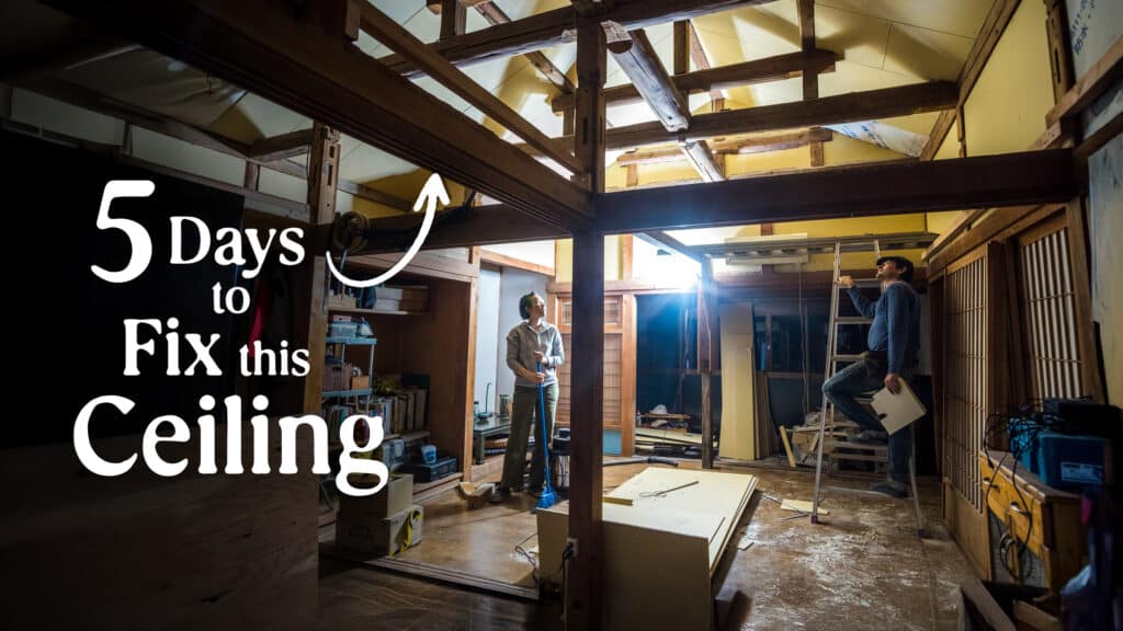 Maigo Mika and Jesse inside their Japanese house, looking up at their completed drywall work on the ceiling
